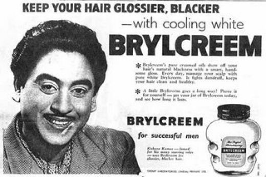 A picture showing the old way of advertising in which Kishore Kumar is promoting Brylcreem hair gel