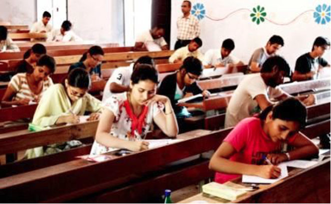 Image depicting students taking a test