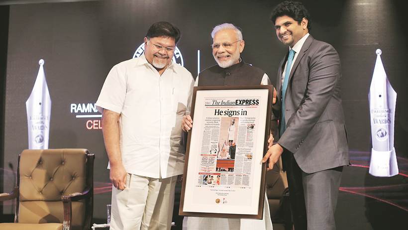 Prime Minister Narendra Modi felicitating the leaders of The Express Group